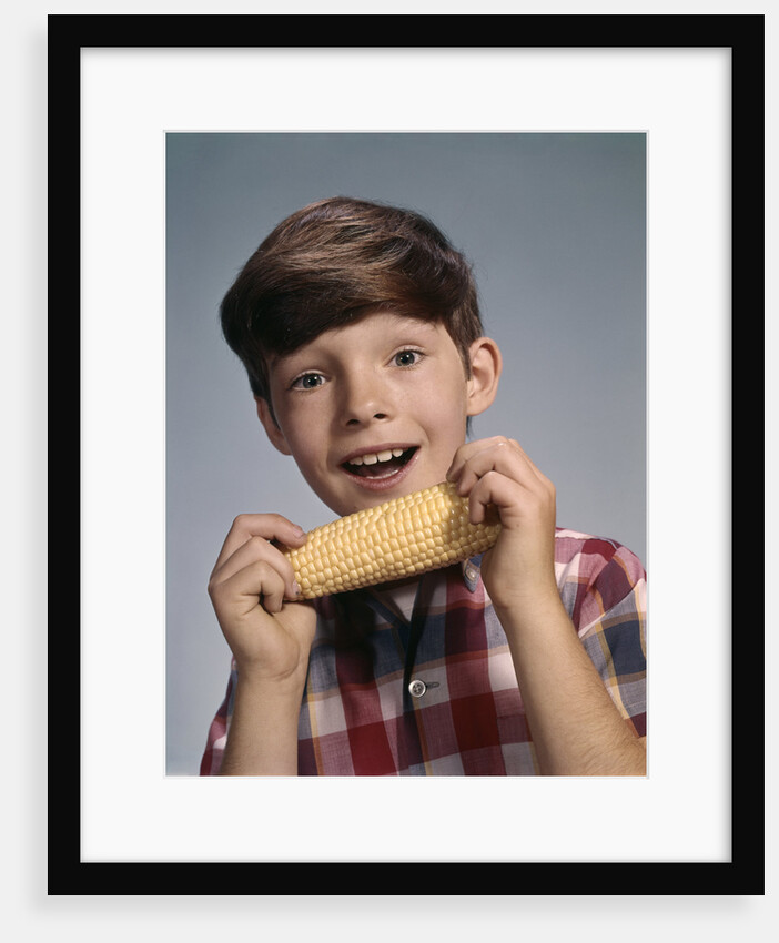 1960s Boy Eating Corn On The Cob by Anonymous