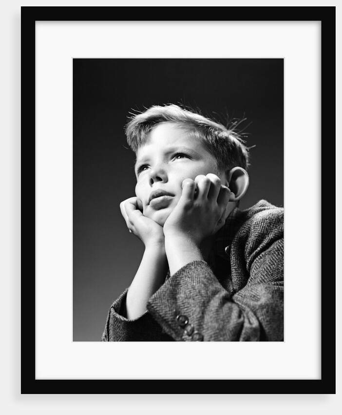 1940s Bored Serious Boy Waiting Chin Resting In Hands by Anonymous