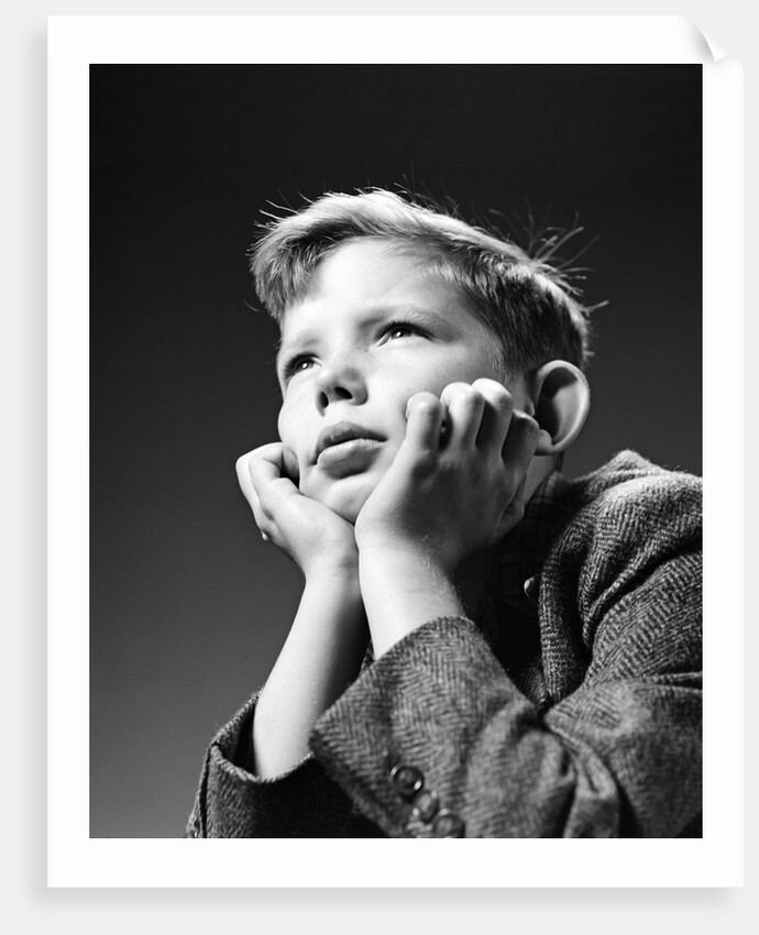1940s Bored Serious Boy Waiting Chin Resting In Hands by Anonymous
