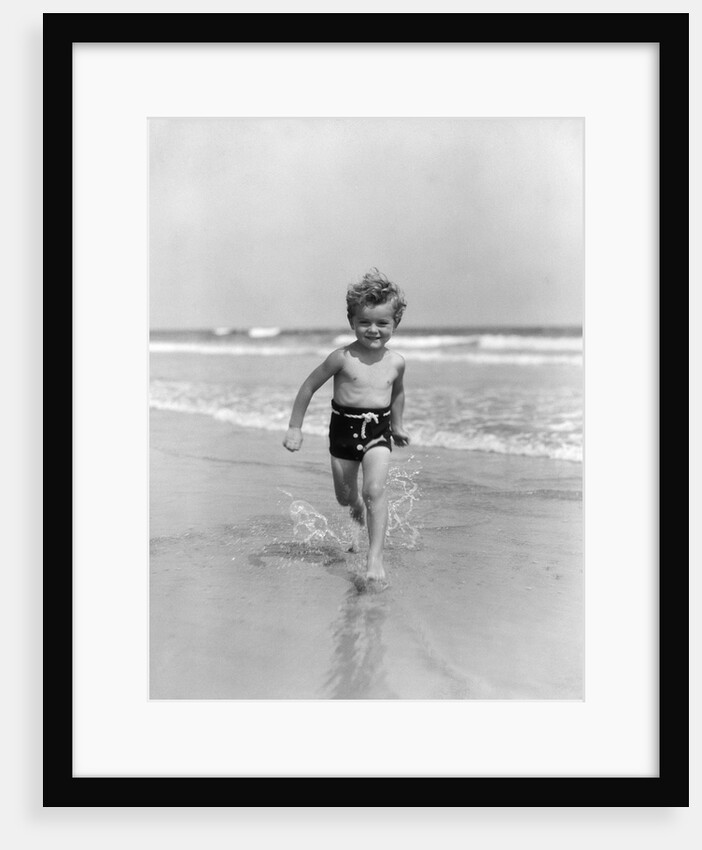 1930s Little Toddler Running In Surf by Anonymous
