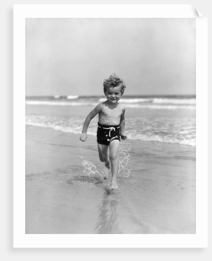 1930s Little Toddler Running In Surf by Anonymous