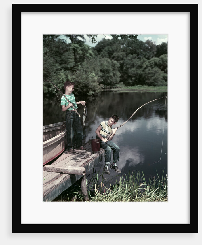 1950s Two Boys Fishing In Lake From Dock Outdoor by Anonymous