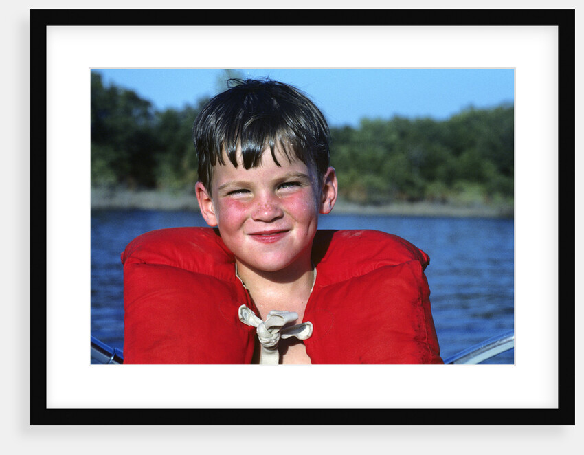 Young Boy Wearing Red Life Preserver by Anonymous