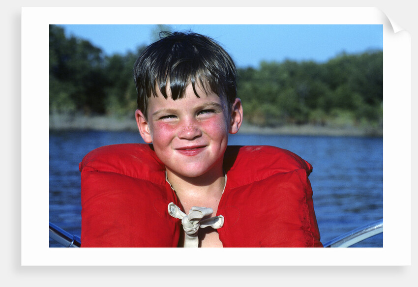 Young Boy Wearing Red Life Preserver by Anonymous