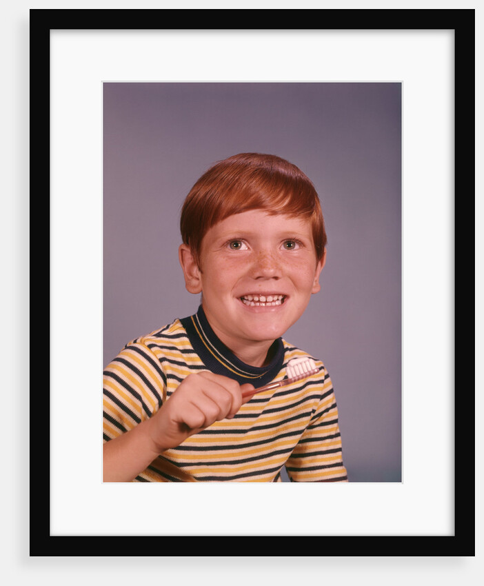1960s Happy Boy Red Hair Striped Tee Shirt Holding Toothbrush Brushing Teeth by Anonymous