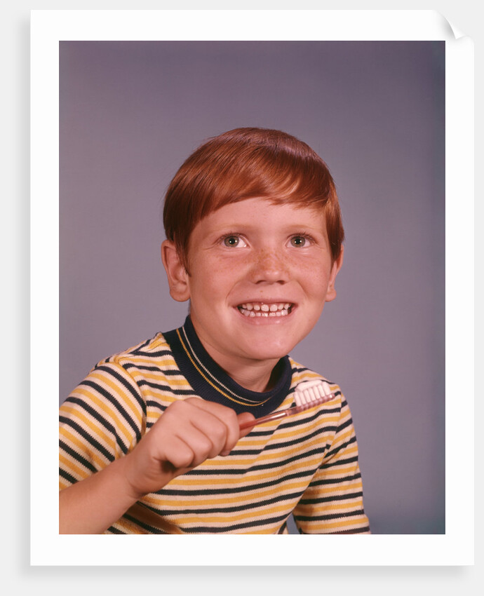 1960s Happy Boy Red Hair Striped Tee Shirt Holding Toothbrush Brushing Teeth by Anonymous