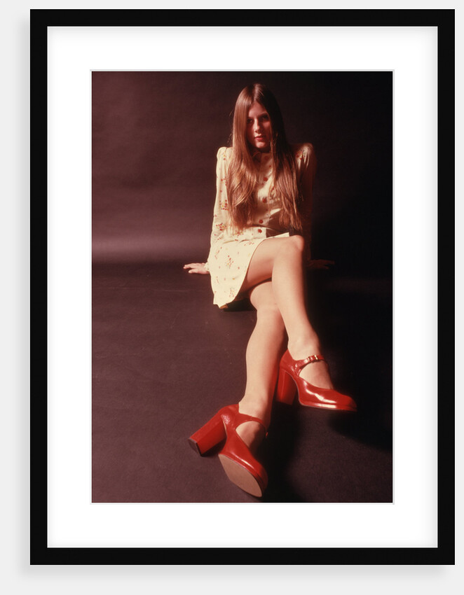 1970s Woman Long Auburn Hair Mini Skirt Dress Red Platform High Heeled Shoes by Anonymous