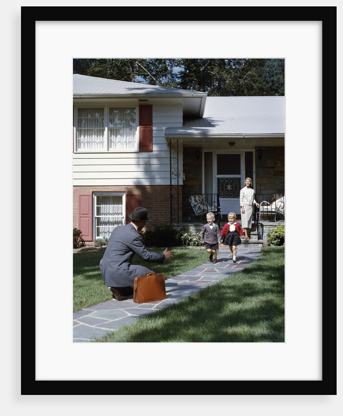 1950s Wife Watching Man Coming Home Arms Extended To Son and Daughter by Anonymous