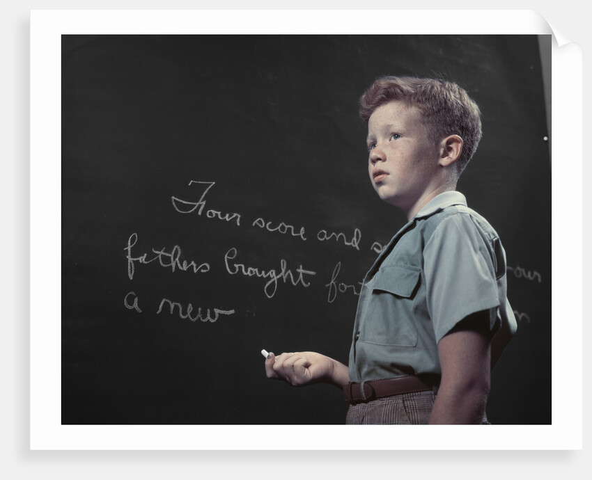 1950s Boy with Freckles At History Class Blackboard Writing Gettysburg Address With Chalk by Anonymous