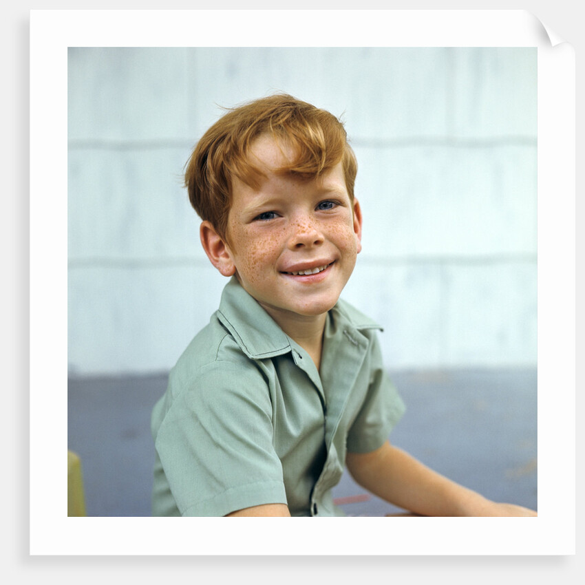 1970s Portrait Of Boy With Red Hair And Freckles by Anonymous