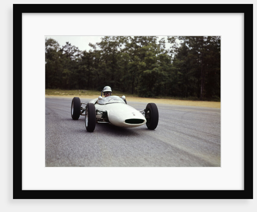 1960s Man Race Car Driver Driving Lotus Ford Sports Car by Anonymous