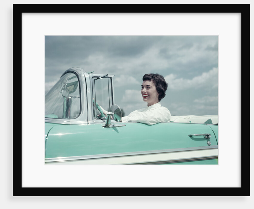 Woman driving 1956 Chevrolet Bel Air Convertible by Anonymous