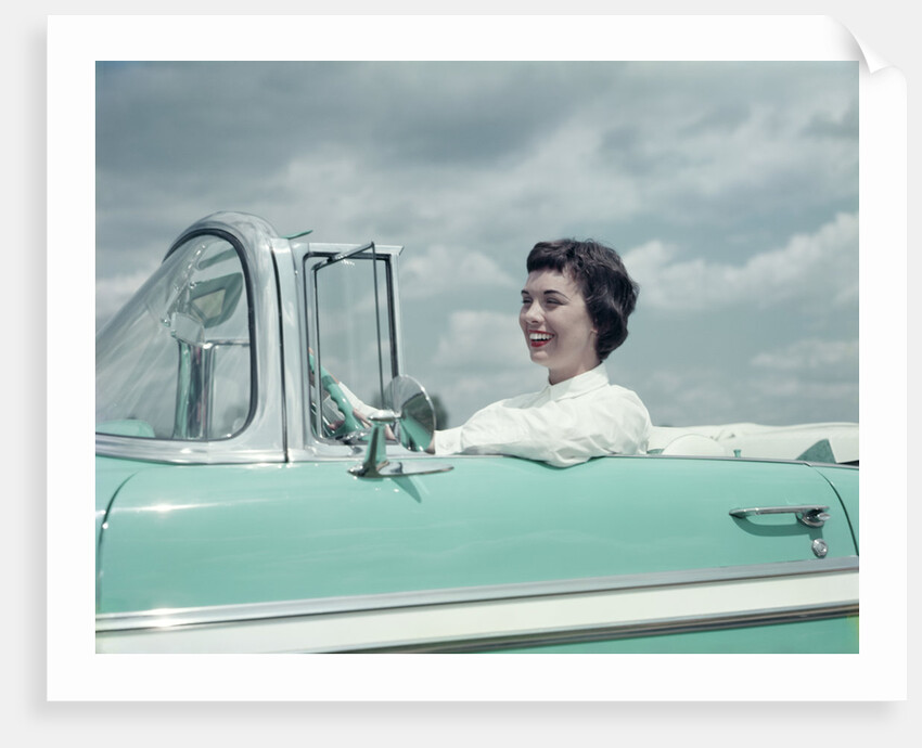 Woman driving 1956 Chevrolet Bel Air Convertible by Anonymous