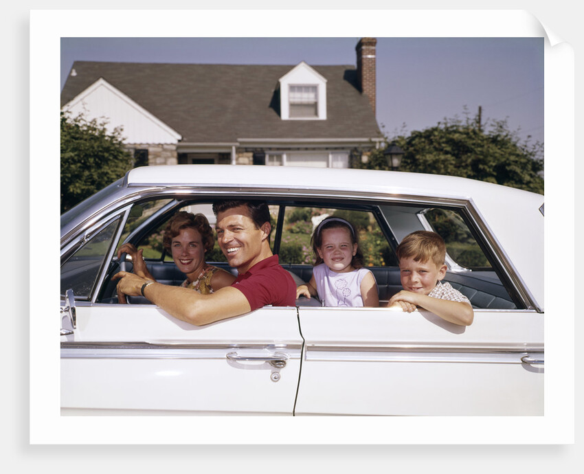1960s Father And Mother With Son And Daughter Sitting In White Four Door Sedan Automobile by Anonymous