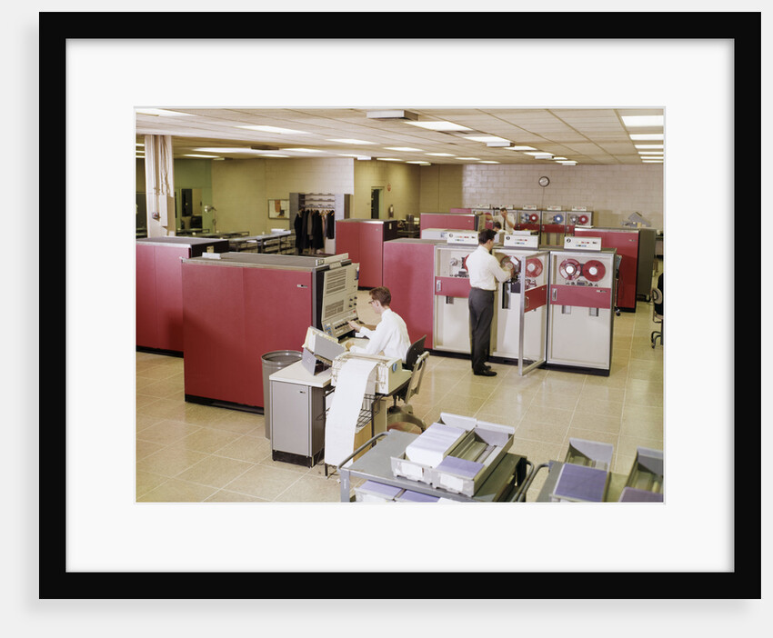 1960s Two Men Computer Programmers In Ibm 3680 Mainframe Computer Room by Anonymous