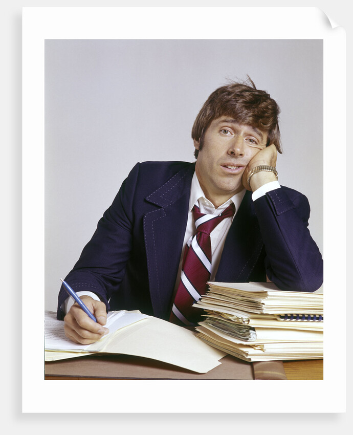 1970s Business Man Exhausted Expression Hand To Face Leaning On Pile Paperwork by Anonymous