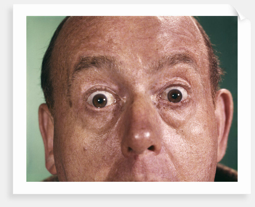 1960s Close-Up Detail Of Florid Man Face With Eyes Open Wide And Staring by Corbis