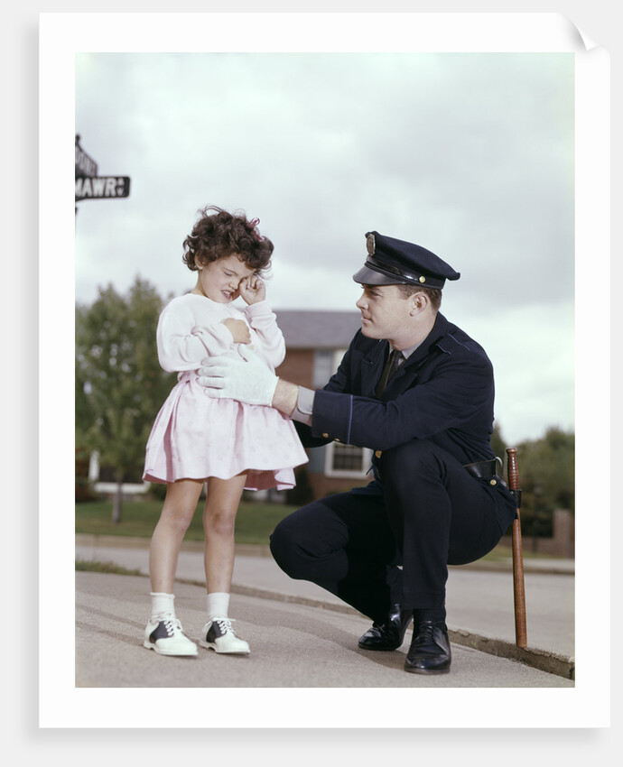 1960s Man Police Officer Comforting Crying Scared Little Lost Girl In Suburban Neighborhood by Anonymous