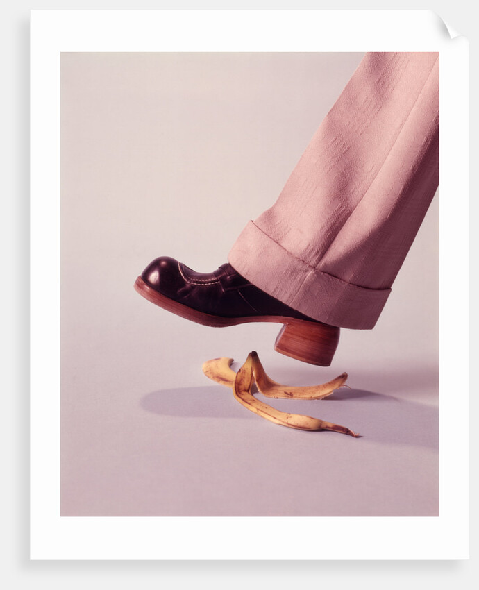 1970s Man About To Slip On Banana Peel by Anonymous