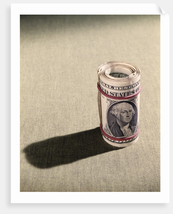 1970s Red Elastic Rubber Bands Around Roll Of One Dollar Bills by Anonymous