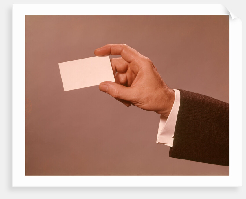 1960s 1970s Man Hand Holding Blank Business Card by Anonymous