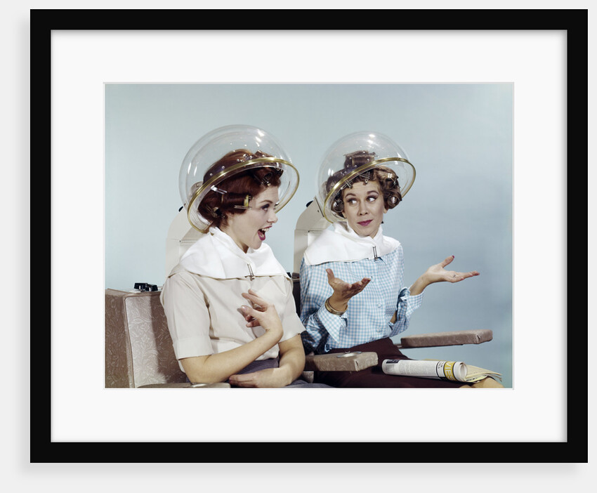 1960s 2 Women Sit Under Beauty Salon Hair Dryers Clear Helmets Hoods Curlers Talking Gossip by Anonymous
