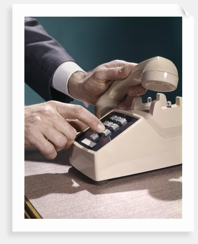 1960s 1970s Man Hands Businessman Salesman Dialing Touch Tone Telephone by Anonymous