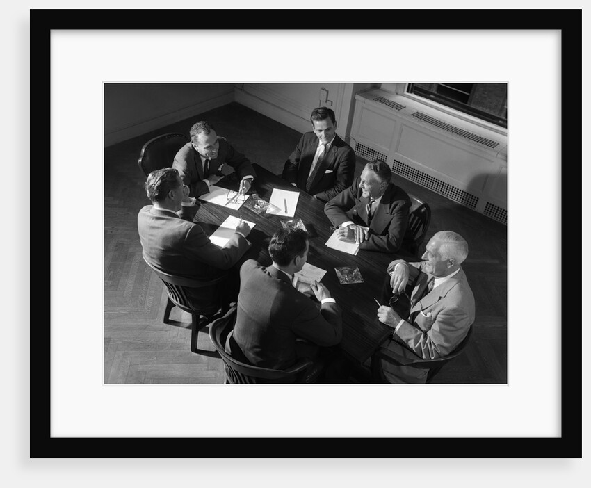 1950s Six Businessmen Salesmen Meeting Seated Around A Conference Table by Anonymous