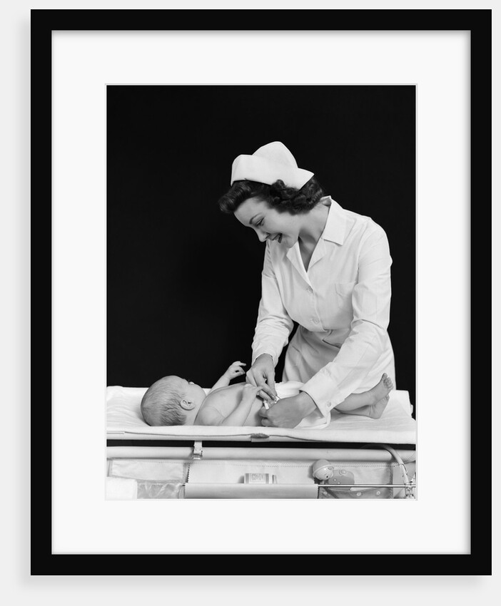 1940s Woman Nurse Changing Baby Diaper In Nursery by Anonymous