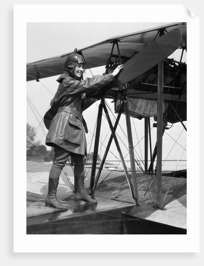 1920s Woman Aviator Turning Float Biplane Propeller by Anonymous