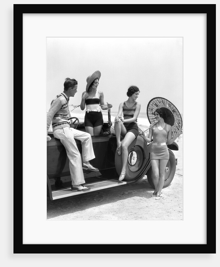 1920s 1930s Man And Three Women In Beach Clothes Or Bathing Suits Posing With Car On Running Board by Anonymous