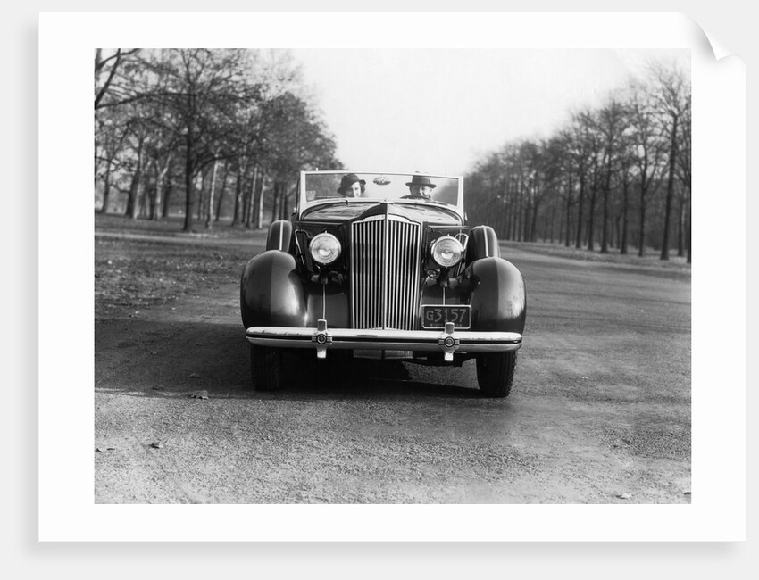 1930s 1935 Couple Driving Packard Convertible Automobile by Anonymous