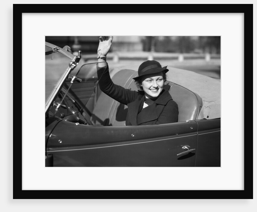 1930s Woman Driving Convertible Roadster Automobile Waving Gloved Hand by Anonymous