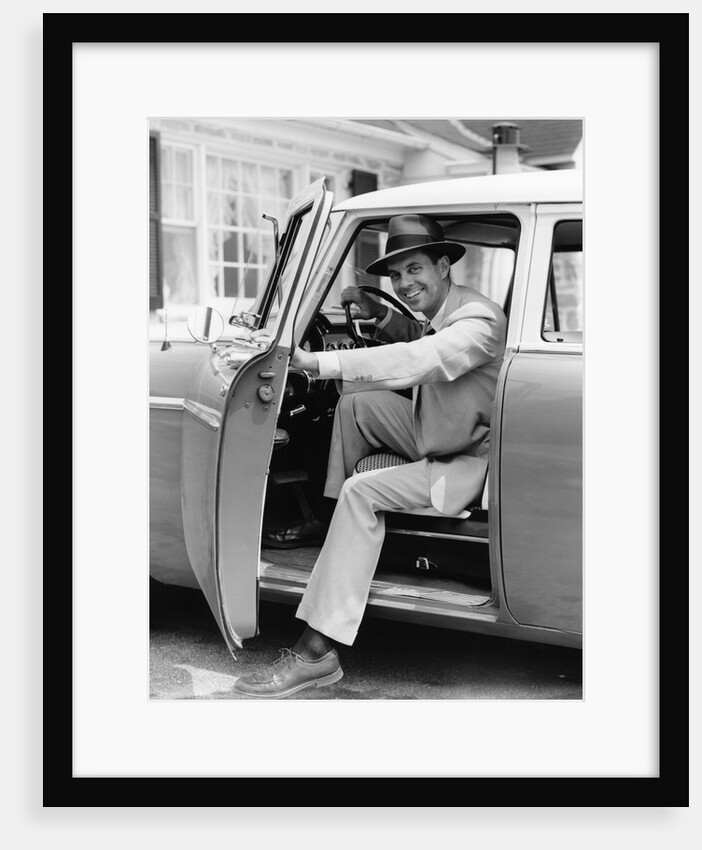 1950s Man Holding Car Door Open by Anonymous