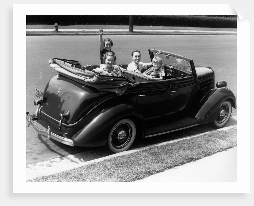 1940s Family Of Four In Convertible Ford V-8 Sedan At Camera by Anonymous