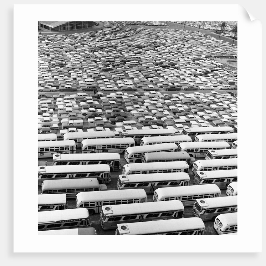 1960s Aerial Of Crowded Stadium Parking Lot With Separate Sections For Buses and Cars by Corbis