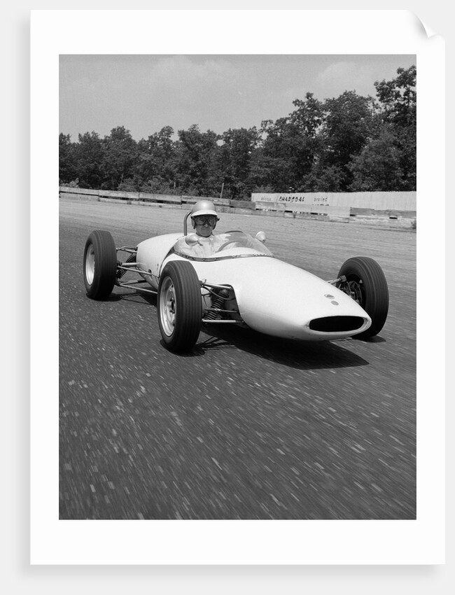 1960s Lotus Ford Race Car Speeding Around Track by Anonymous
