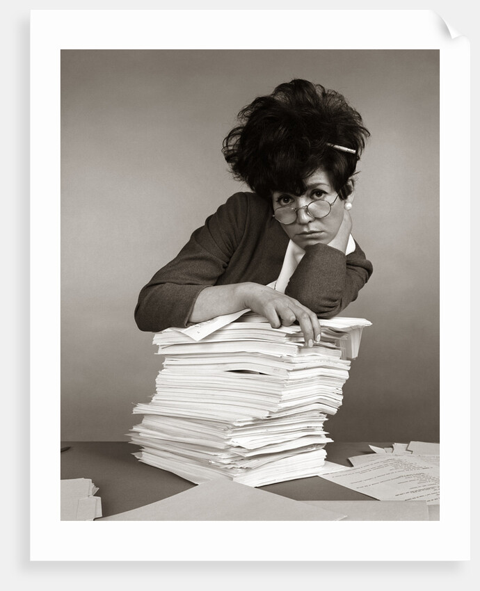 1960s 1970s Secretary with Pencil Stuck In Teased Hair Overworked Expression by Corbis