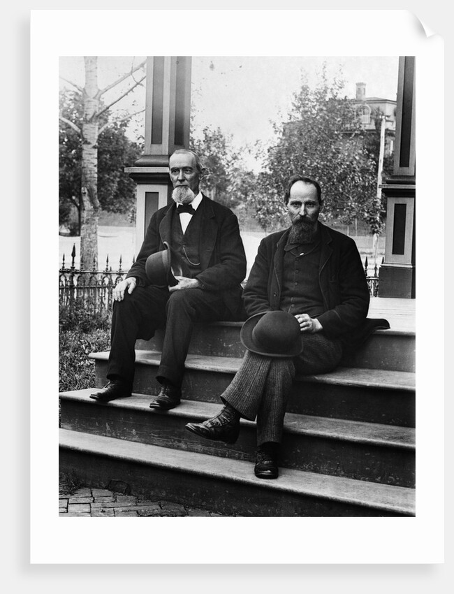 1890s 1900 Two Bearded Men In Suits Holding Bowler Hats Sitting On Stairs In Front Of House by Anonymous