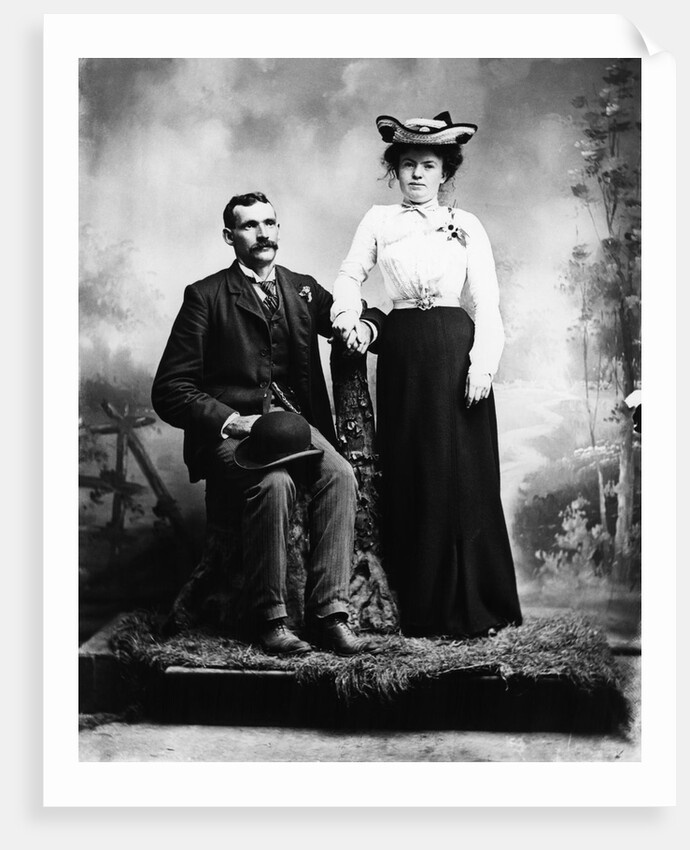 1890s 1900 Portrait Serious Couple Holding Hands Together In Rustic Studio Setting by Anonymous