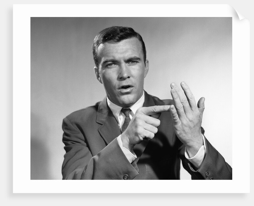 1950s Earnest Salesman Talking Gesturing With Hands by Anonymous