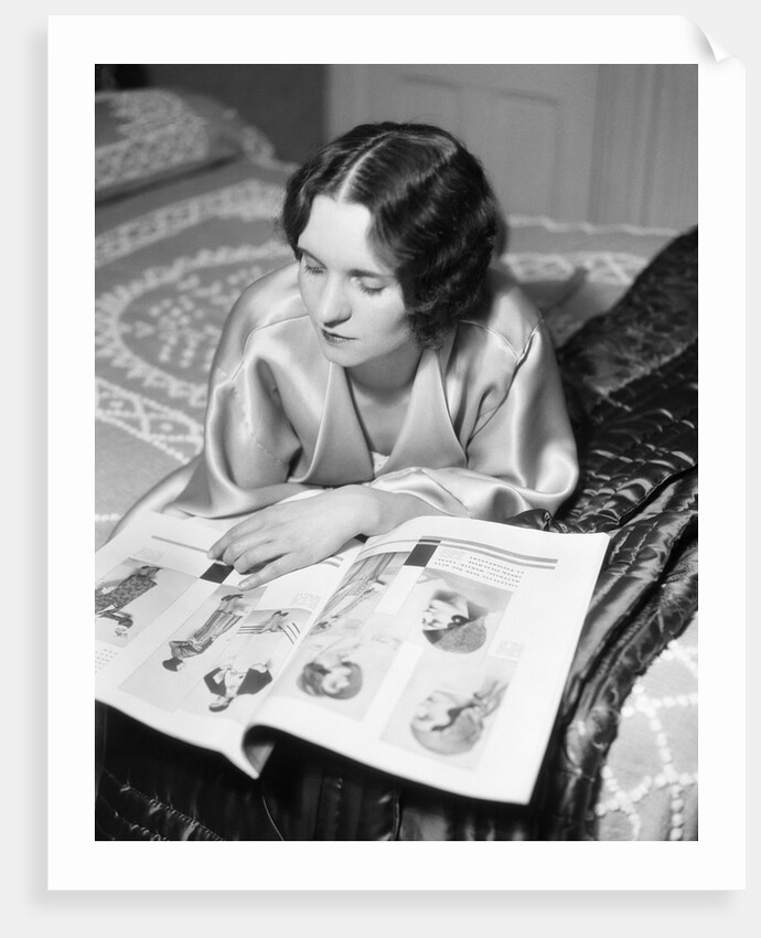1920s 1930s Reclining Woman With Marcel Wave Hair Style Reading A Fashion Magazine by Anonymous