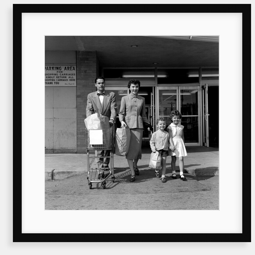 1950s Family Walking Out Of Supermarket Store by Anonymous