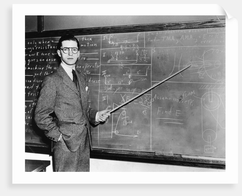 1930s Man Teacher Looking At Camera With Pointer At Blackboard by Anonymous