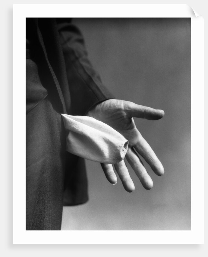 1930s Man's Hand Turning Empty Pants Pocket Inside Out by Anonymous