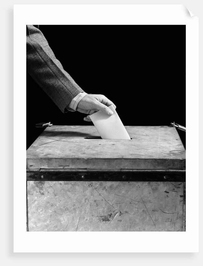 1930s 1940s Man's Hand Putting Ballot In Slot In Box by Anonymous