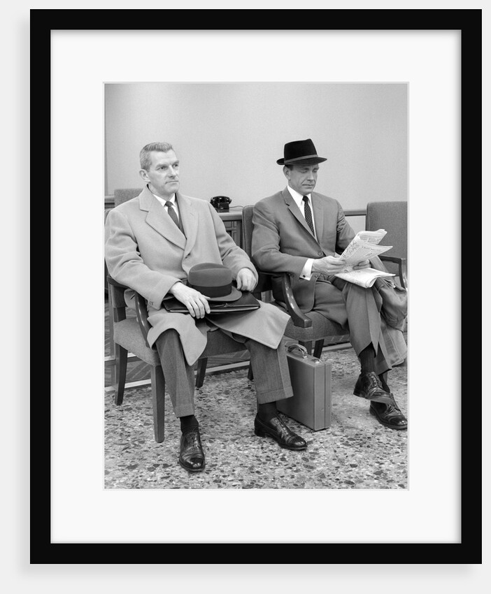 1950s 1960s Two Men Businessman Salesman Sitting In Office Reception Waiting Area Indoor by Anonymous