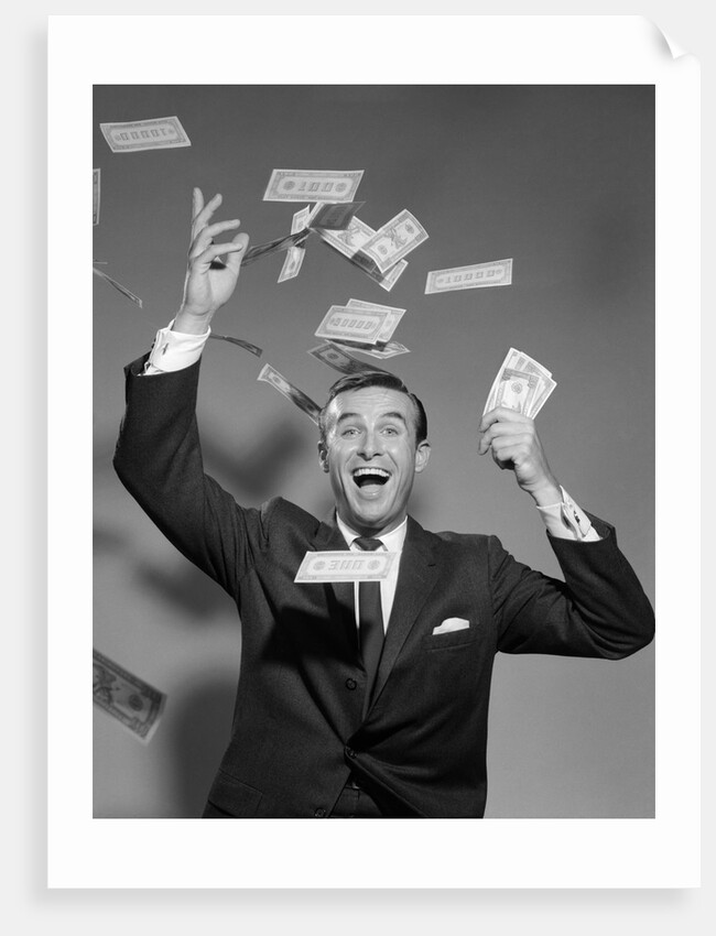 1960s Happy Man Throwing Money Currency Bank Notes In The Air by Anonymous