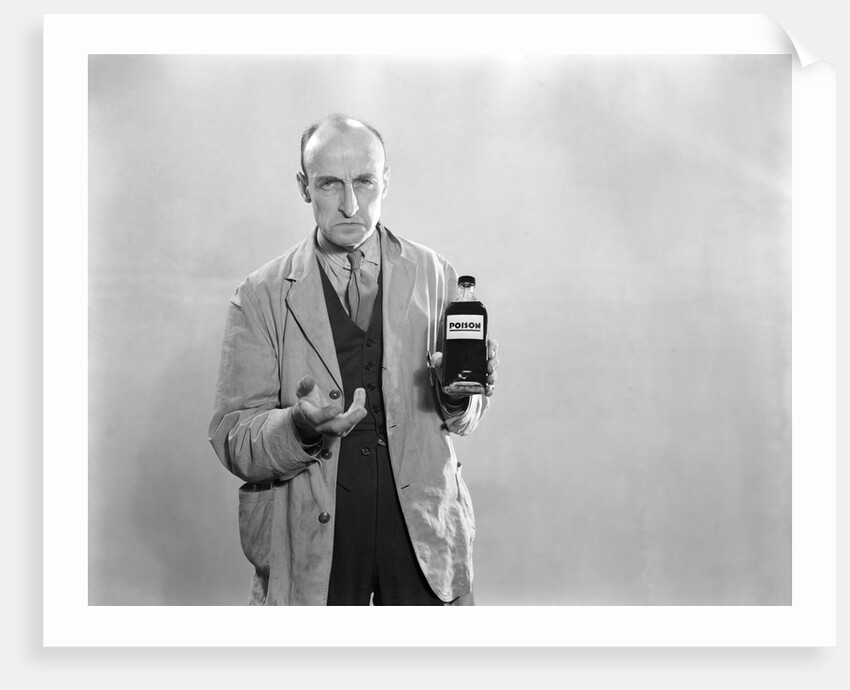 1930s Dour Man In Lab Coat Holding Bottle Of Poison by Anonymous