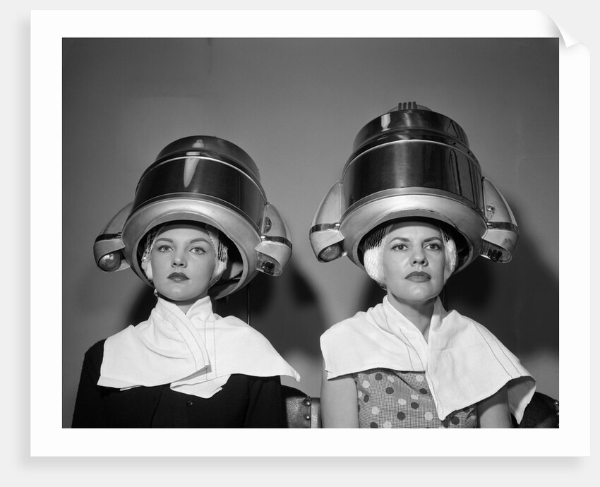 1950s Two Women Under Hair Dryers Towels Around Shoulders Hair Nets by Anonymous